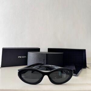 Prada Oval Sleek Black Eyewear